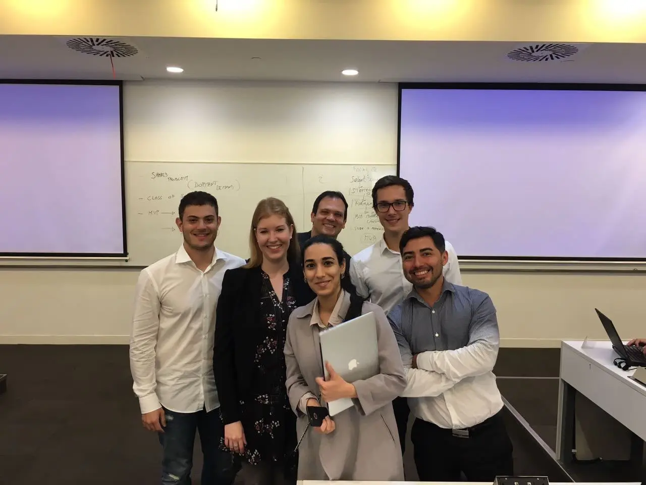 Gustavo with colleagues after a corporate training session.