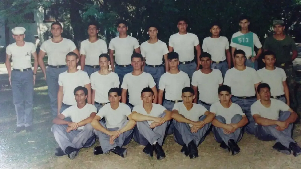 Gustavo with his Argentinian Navy training cohort outdoors.
